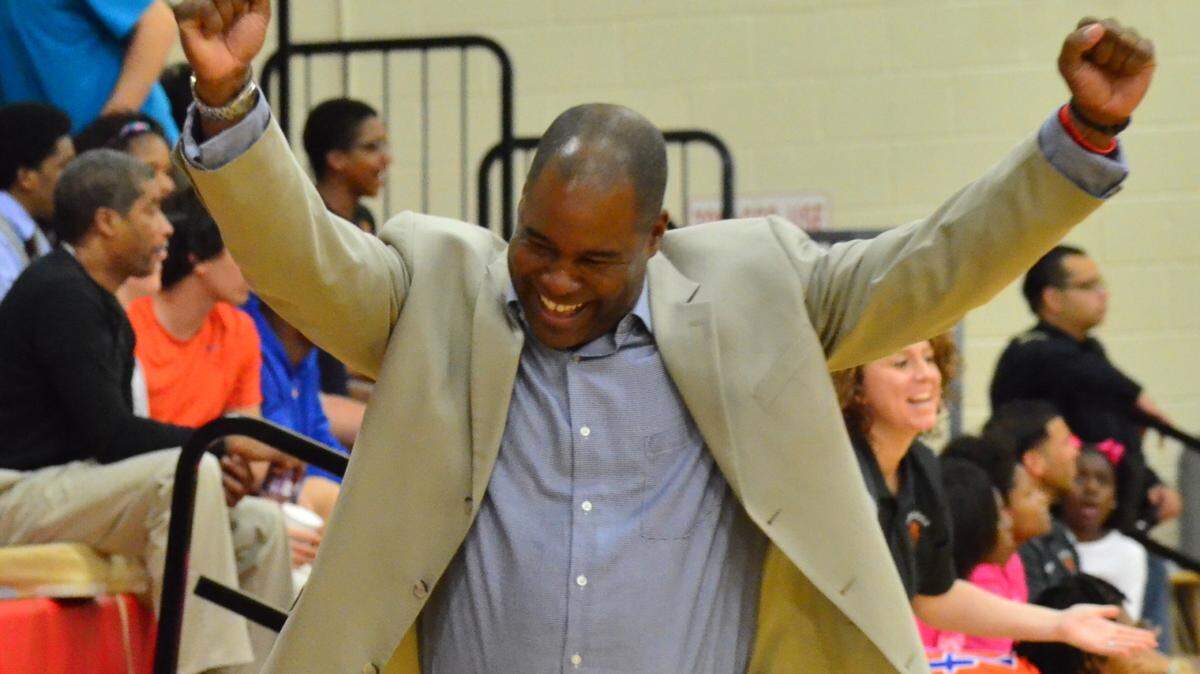Hardaway girls coach Kendall Mills celebrates upset of Columbus on Tuesday night.