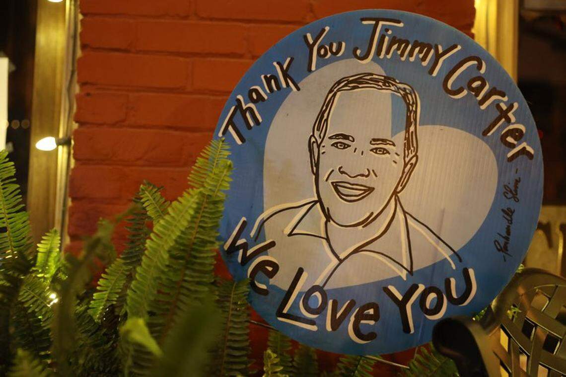This sign from Main Street in Plains, Georgia, thanking Carter for all he did, was seen the evening of former president Jimmy Carter’s death on Sunday, Dec. 29, 2024. Carter died in his home in Plains on Sunday afternoon at 100 years old.