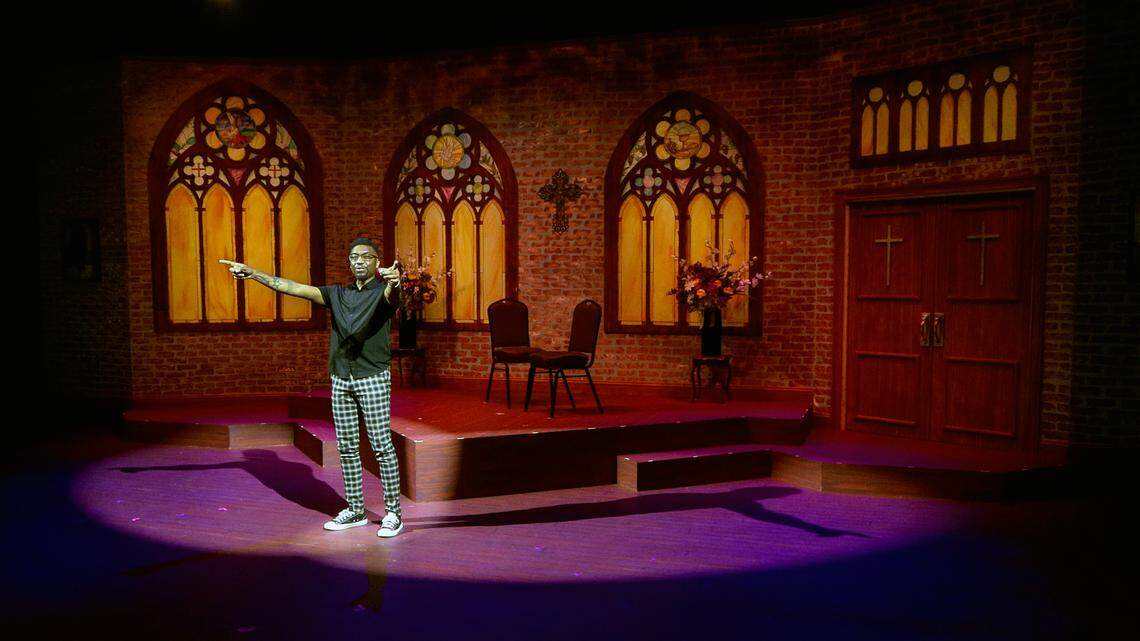 Keith McCoy, artistic director at the Springer Opera House, rehearses April 15, 2026, his curtain speech for the Springer’s current production of “Chicken & Biscuits.”