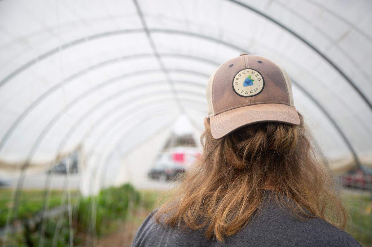 Farmer Keith Sims inside of the greenhouse he cultivates at MercyMed Farm on May 4, 2022, in Columbus, Ga.