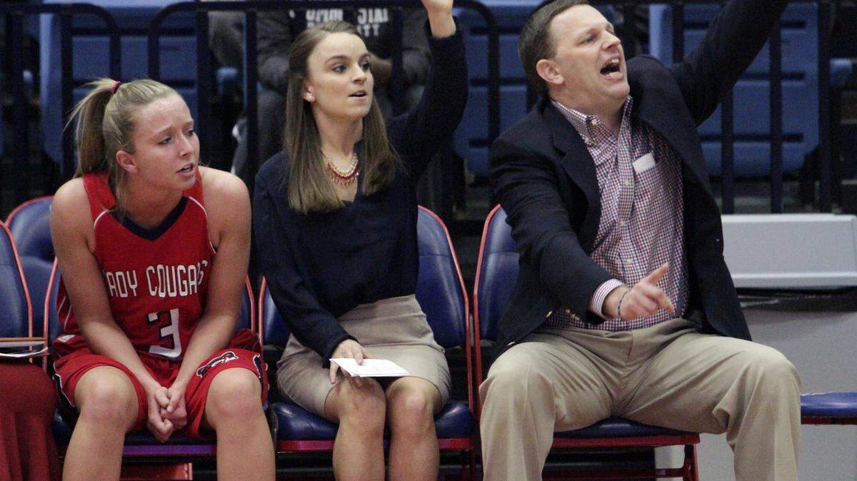 ROBIN TRIMARCHI rtrimarchi@ledger-enquirer.com 
 Columbus State University head women's basketball coach Jonathan Norton, right, calls a play with assistant coach Kiersten Reid, center, and Eryn Cochran, left, during first half play against Lander at the Lumpkin Center Tuesday. 01.19.16