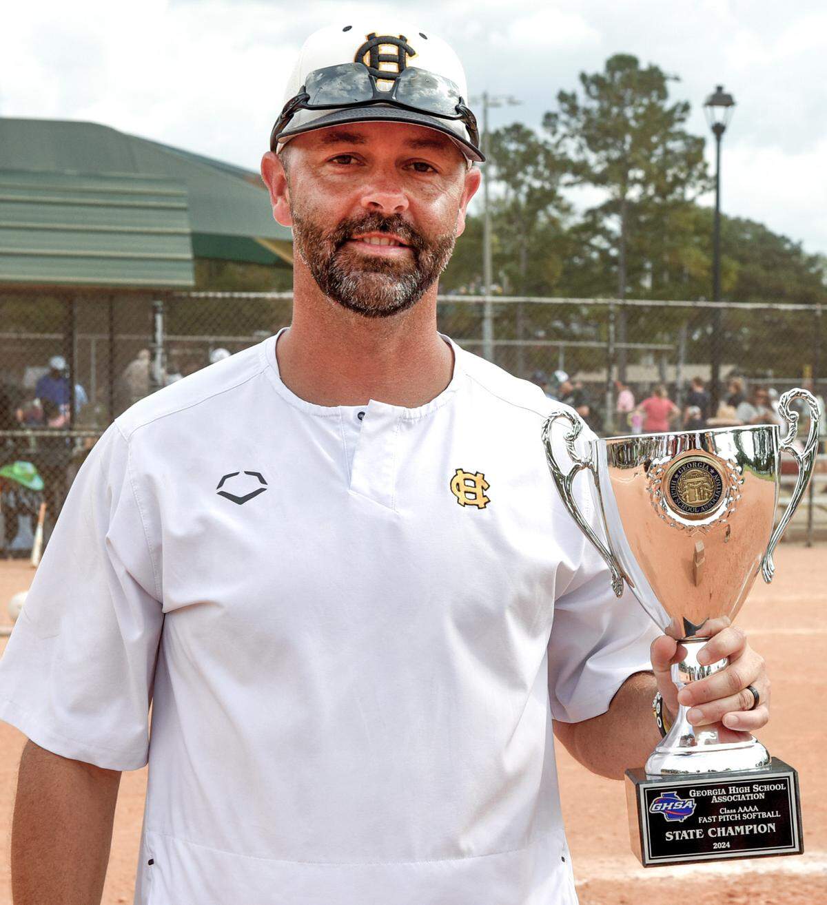 Harris County High School softball head coach Brandon Jenkins poses for a photo after winning the Georgia High School Association Class AAAA state championship Nov. 2, 2024, at South Commons in Columbus.