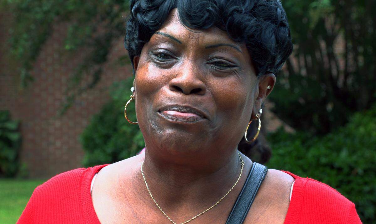 Cheryl Cartwright, mother of Derrick Cartwright, answers questions about her son’s case Friday morning, Sept. 27, 2019, outside of the Muscogee County Jail. 