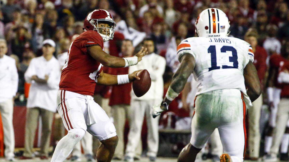 Alabama quarterback Tua Tagovailoa (13) throws a pass against Auburn during the second half of their game Saturday in Tuscaloosa, Ala.