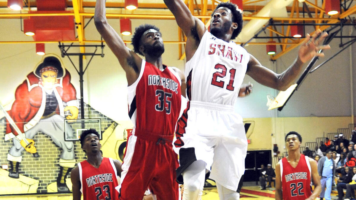 Northside?s Davion Thomas tries to defend against Shaw?s Dakeen Diaz in 2nd period of the game Tuesday night 
