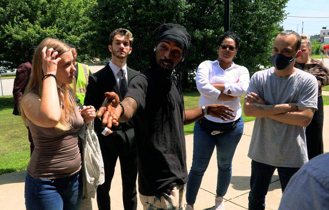 Gadget Jackson, center, speaks with other protesters outside of Columbus Recorder’s Court in Columbus, Georgia during a break in the proceedings. Nineteen of the 22 people Columbus police arrested Sunday after a demonstration against racial injustice pleaded to misdemeanor charges Tuesday in Columbus Recorder’s Court so their bond money could be refunded. Only one pleaded guilty. The rest pleaded no contest, meaning they admitted no guilt but chose not to fight the charges. All were released with credit for the time they spent in jail Sunday night.