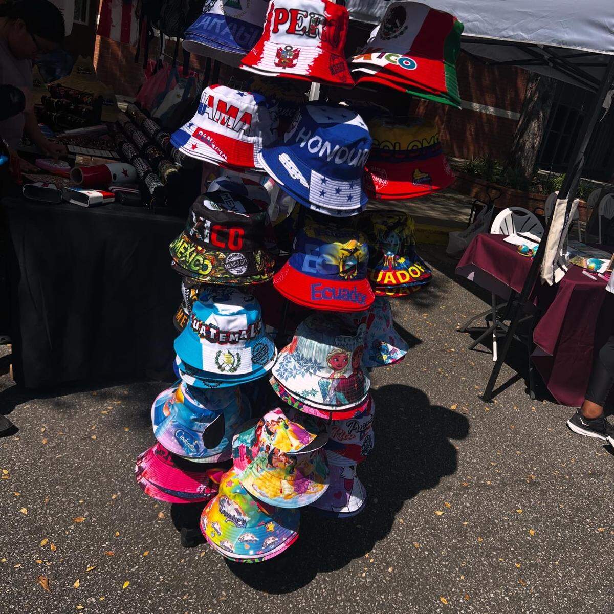 One of the vendors, La Palmita Souvenirs, had all sorts of fun trinkets, including this multi-national rack of hats.