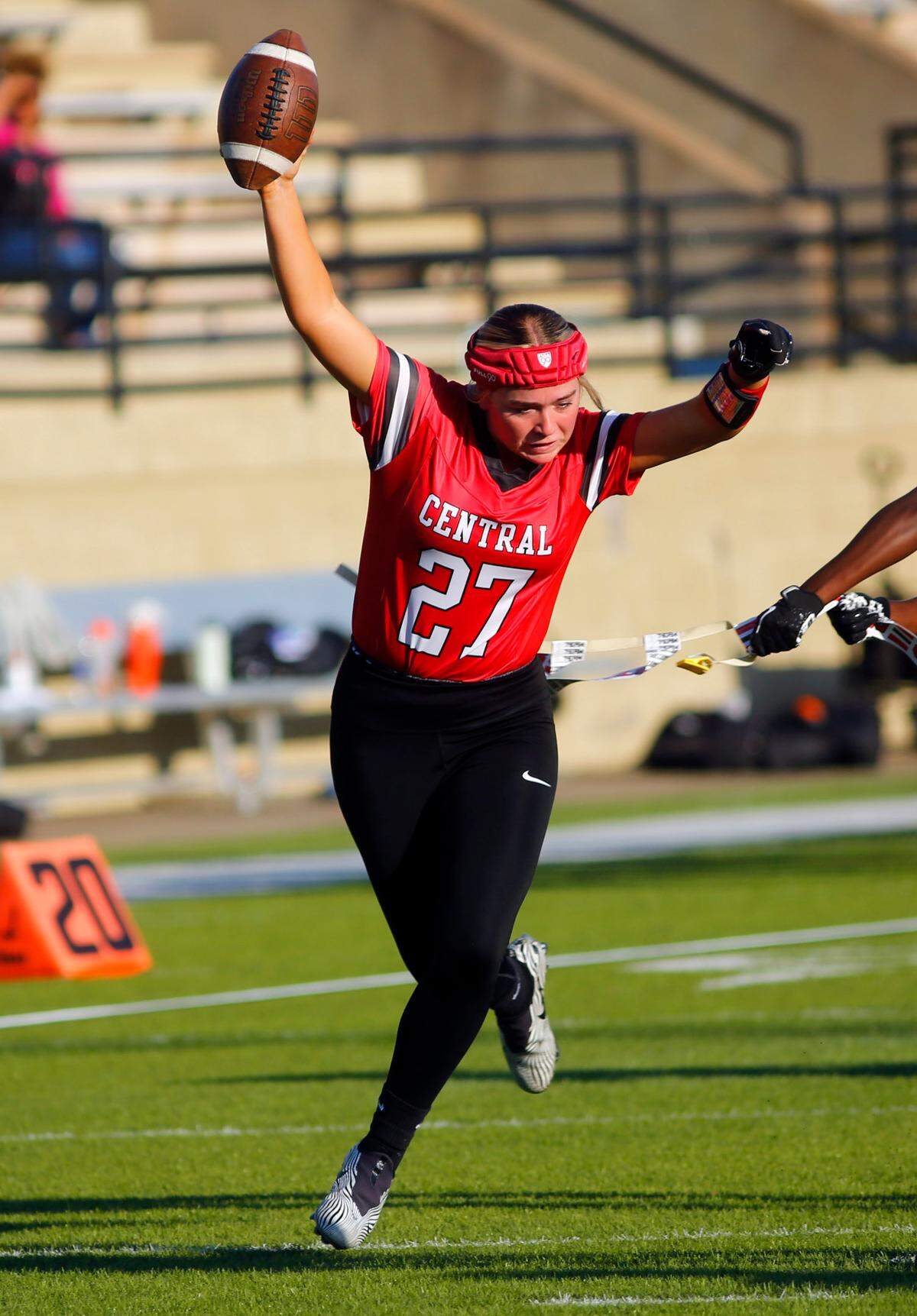 Central’s Khloe Broadwater(27), tries to avoid a Brewbaker Tech defender Monday afternoon. The varsity flag football team from Central High School in Phenix City, Alabama defeated Brewbaker Tech 48-0 Monday at Garrett-Harrison Stadium. 10/14/2024