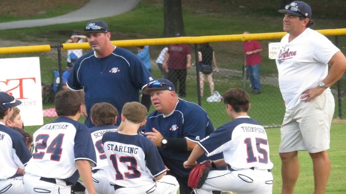 Skip Thompson (kneeling) and his 10-12-year-old Northern baseball team overcame an opening loss in the District 8 tournament to clinch a spot at state.