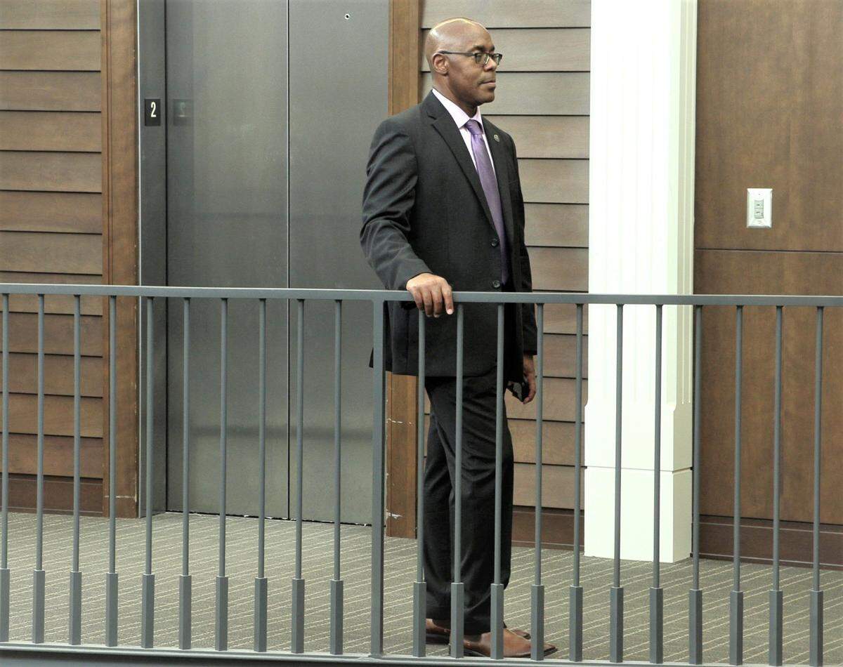 Columbus Police Chief Freddie Blackmon waits outside Columbus Council’s closed session.