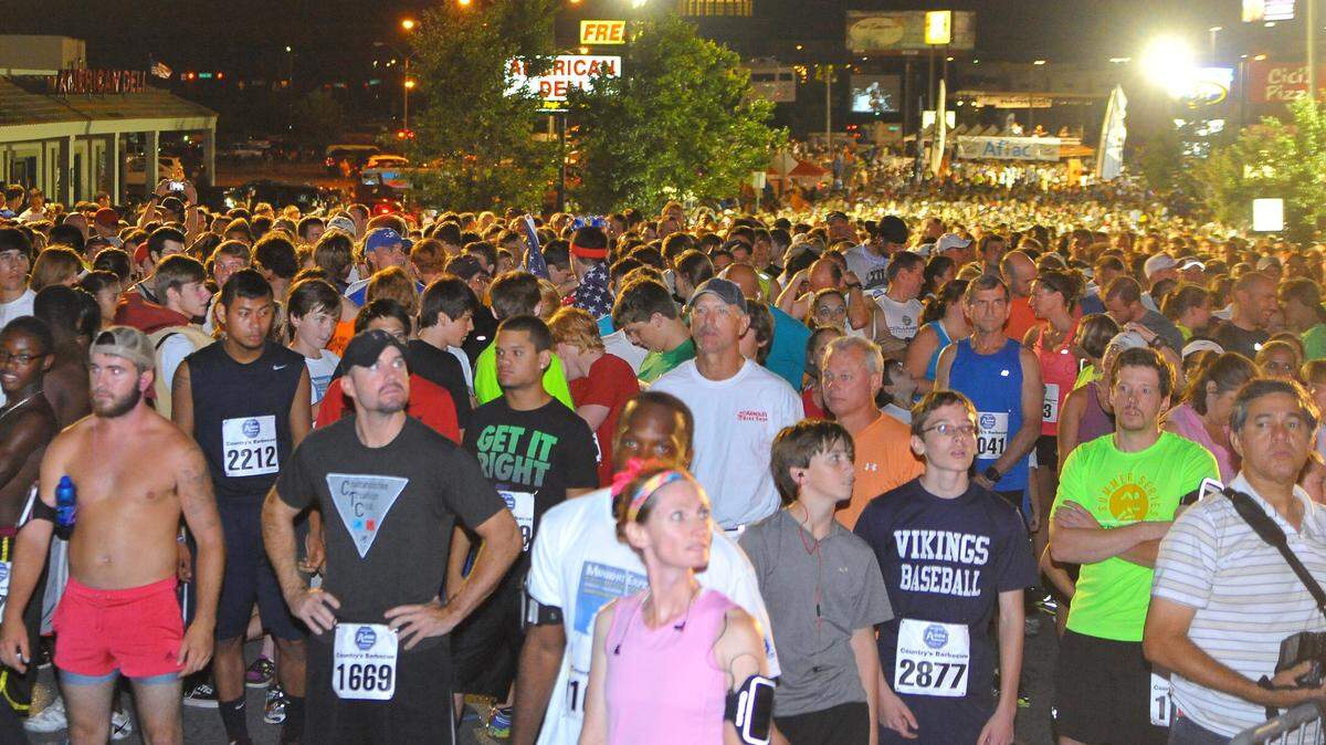 Participants gather behind the starting line, ready to begin the 2014 Country's Midnight Express.