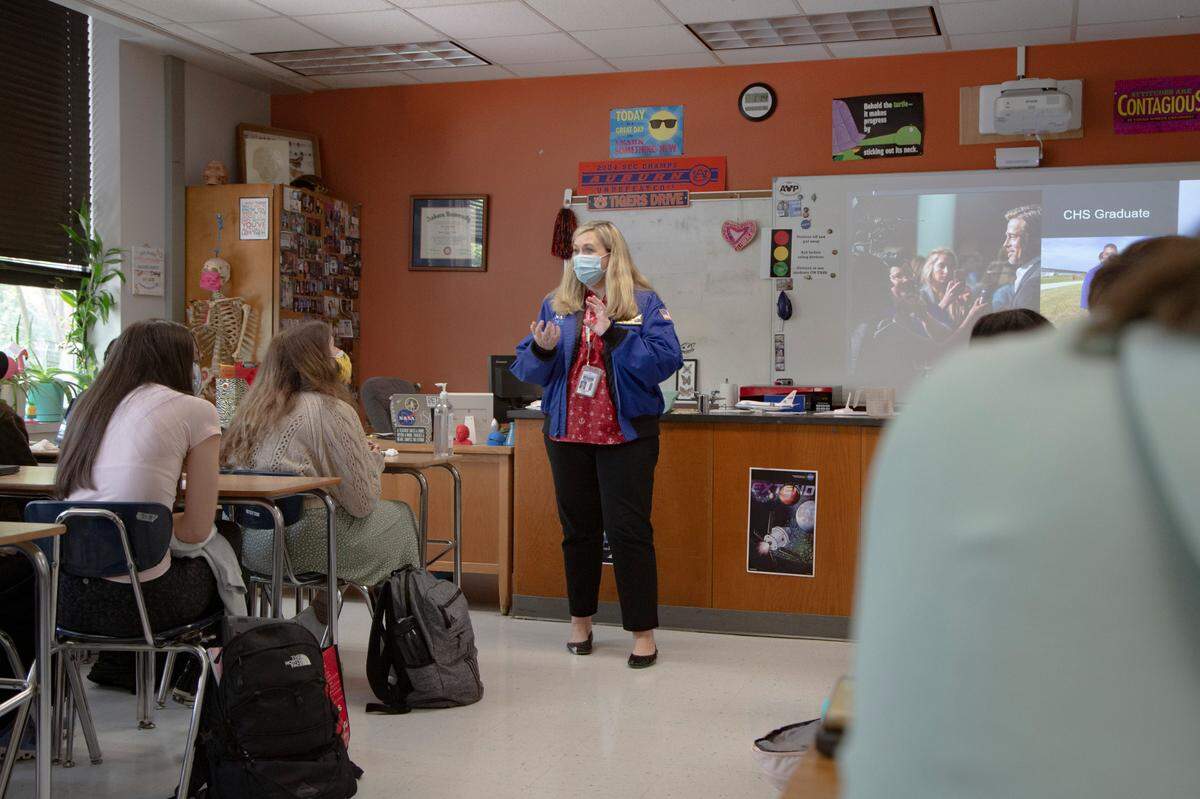 Science teacher Laura Solomons describes the NASA flight she boarded in June 2021 to her students at Columbus High School on August 25, 2021 in Columbus, Ga.