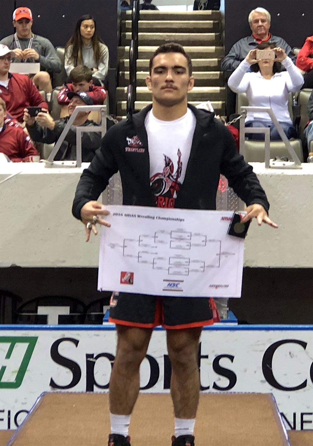 Central senior Tony Morales had three consecutive pins in the state tournament, the last giving him his third state championship.