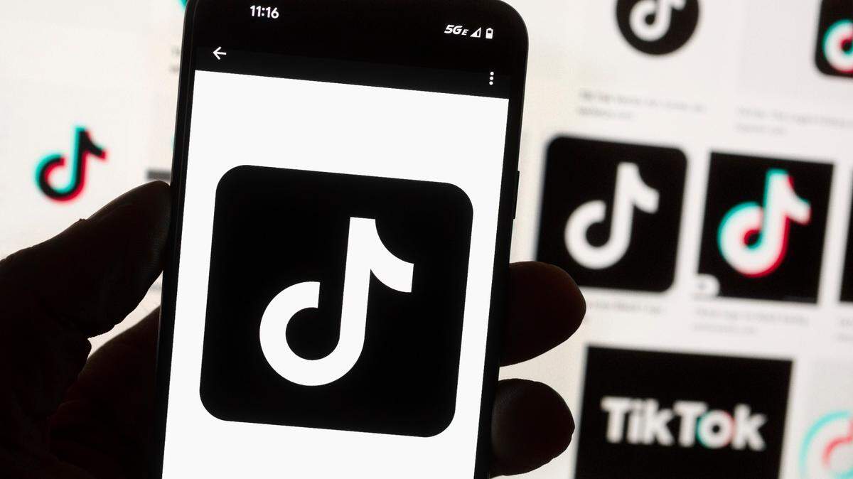 The TikTok logo is seen on a mobile phone on Oct. 14, 2022 in Boston. Citing security risks, N.C. Gov. Roy Cooper signed an executive order on Jan. 12, 2023 banning use of TikTok, WeChat and certain apps on state-owned phones.
