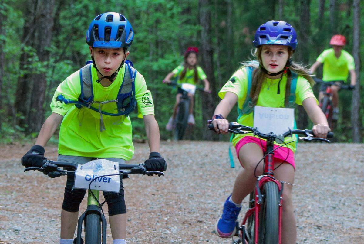 The Georgia Cycling Association’s Trail Rangers program teaches basic mountain biking skills to students in grades 2-5. It also provides them the opportunity to participate in a series of expedition days with other riders across Georgia. Some of them are pictured during practice April 6, 2026, at Standing Boy Trails in Columbus.