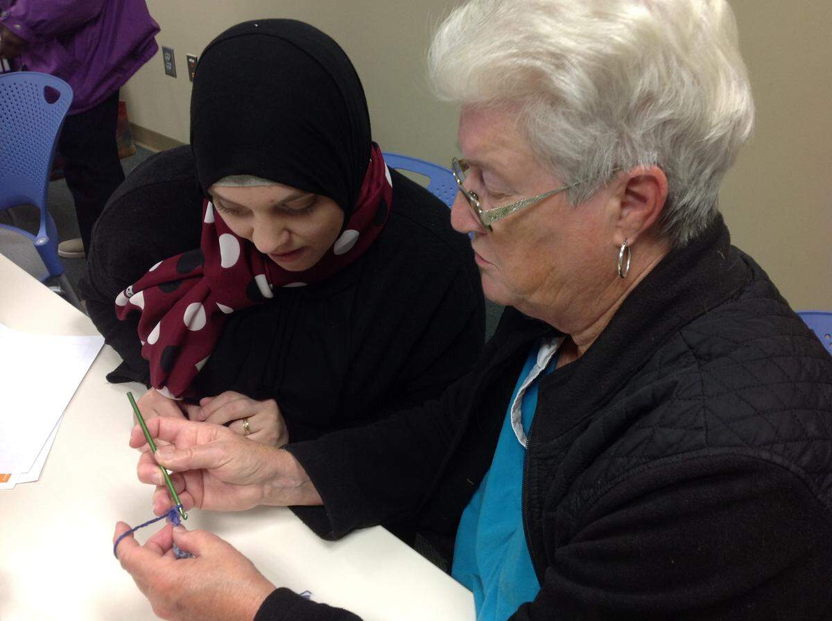Loretta Maehr, right, teaches Amy Wilson how to crochet during the club's December 9, 2017, session in the Mildred L. Terry Public Library. The club meets the second and fourth Saturday of each month, from 4 to 5:30 p.m.