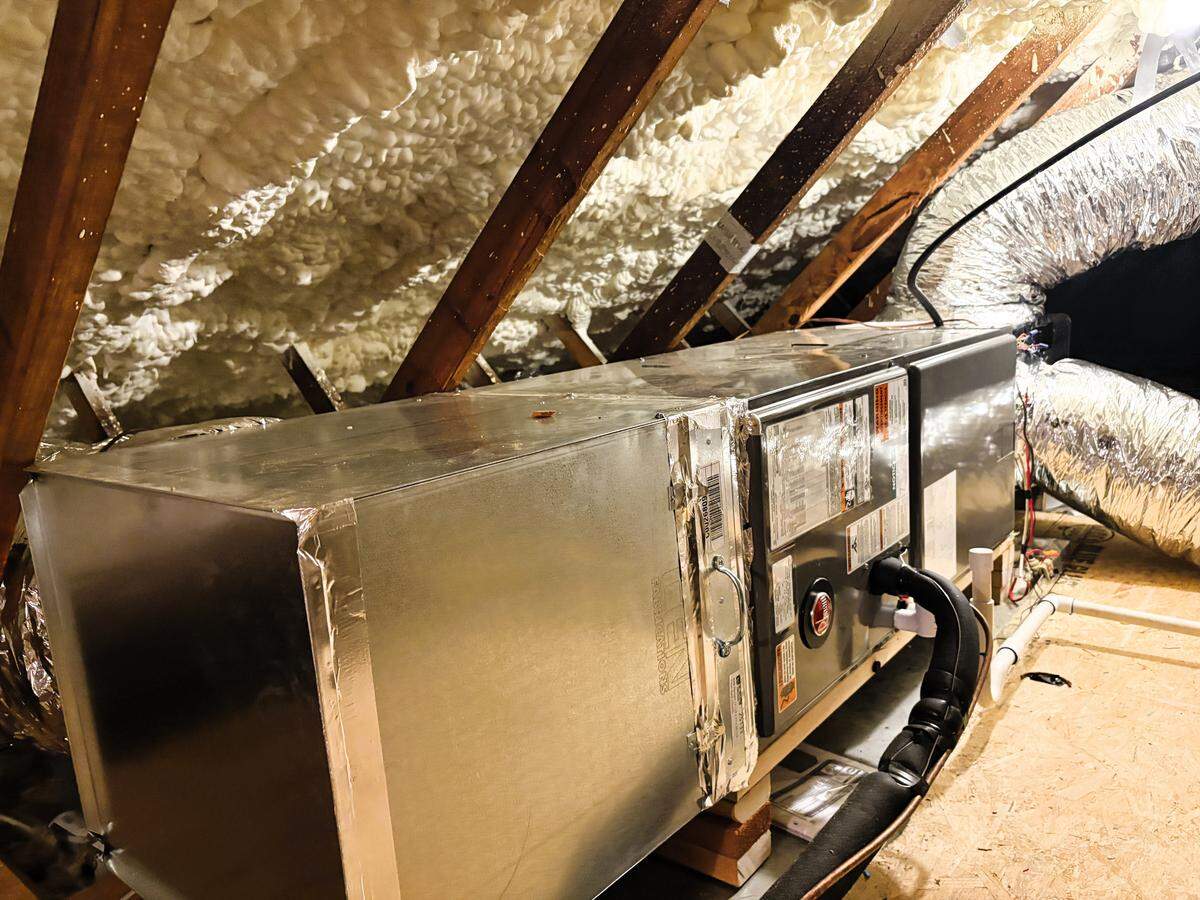 A new heat pump and foam spray insulation in Sara Vinson’s attic cost 70% of what it would normally cost because she used the federal Inflation Reduction Act tax credits.