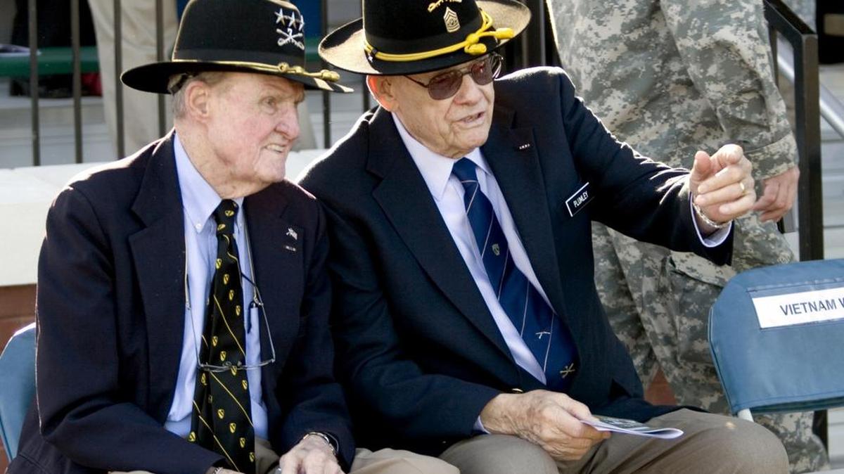Retired Lt. Gen. Hal Moore, left, and Retired Command Sgt. Maj. Basil L. Plumley, who served together with the 1st Cavalry Division in the Ia Drang Valley, talk at the National Infantry Museum and Soldier Center in Columbus, Ga., in March 2009. Moore died Friday at age 94.