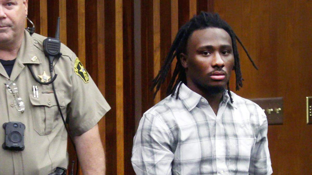 Lydell Maynard “Trapa” Sparks, right, enters the courtroom Tuesday afternoon.