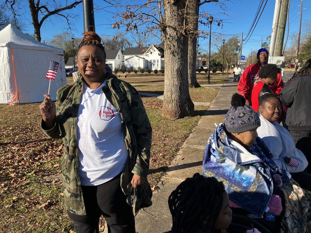 Kathy Cross, whose family had close personal connections with former President Jimmy Carter’s family, lined up along the motorcade route in Plains, Ga., on Jan. 4, 2025.