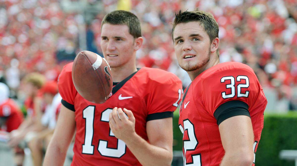 BEAU CABELL/The TelegraphGeorgia place kicker Marshall Morgan, left, and punter Collin Barber keep busy on the sidelines as the Bulldogs drive on Buffalo Sept. 1, 2012. Georgia beat Buffalo, 45-23.