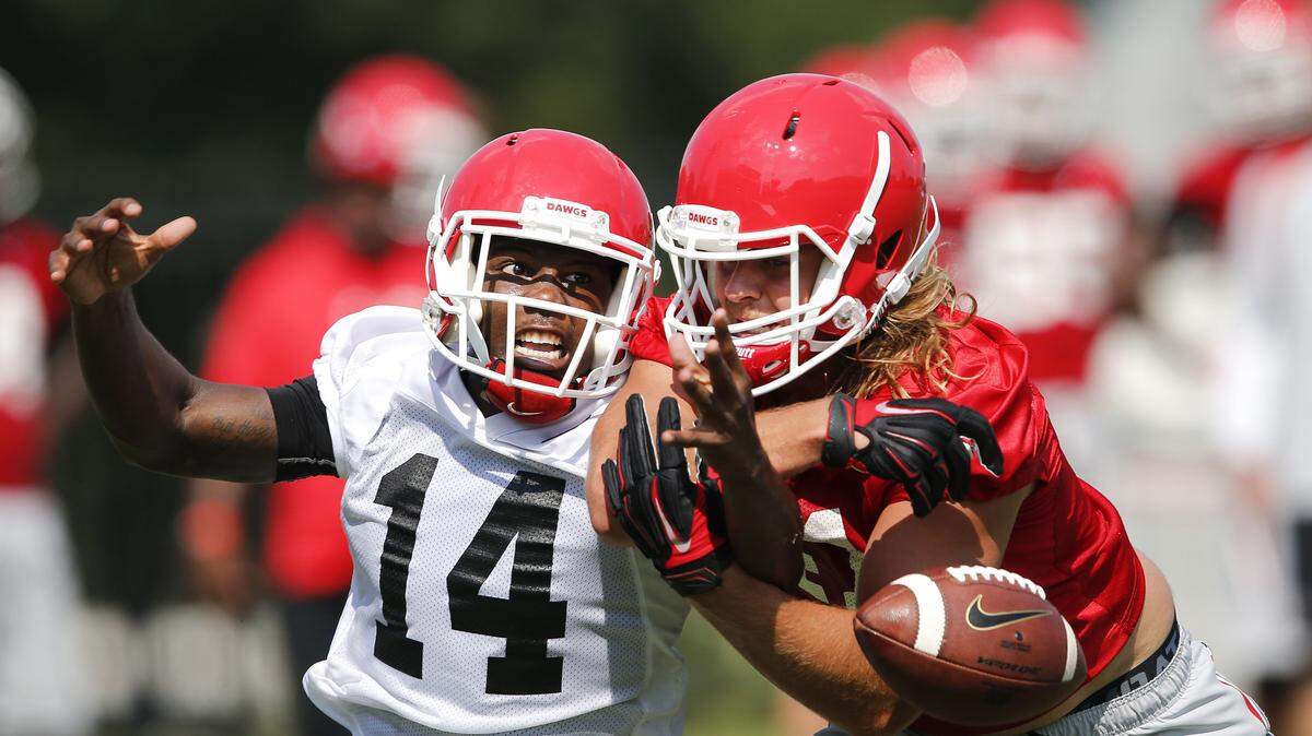 JOHN BAZEMORE/ASSOCIATED PRESSGeorgia defensive back Malkom Parrish (14) breaks up a pass intended for Jared Chapple during practice earlier this week. Parrish will play a key role for second-year defensive coordinator Jeremy Pruitt.