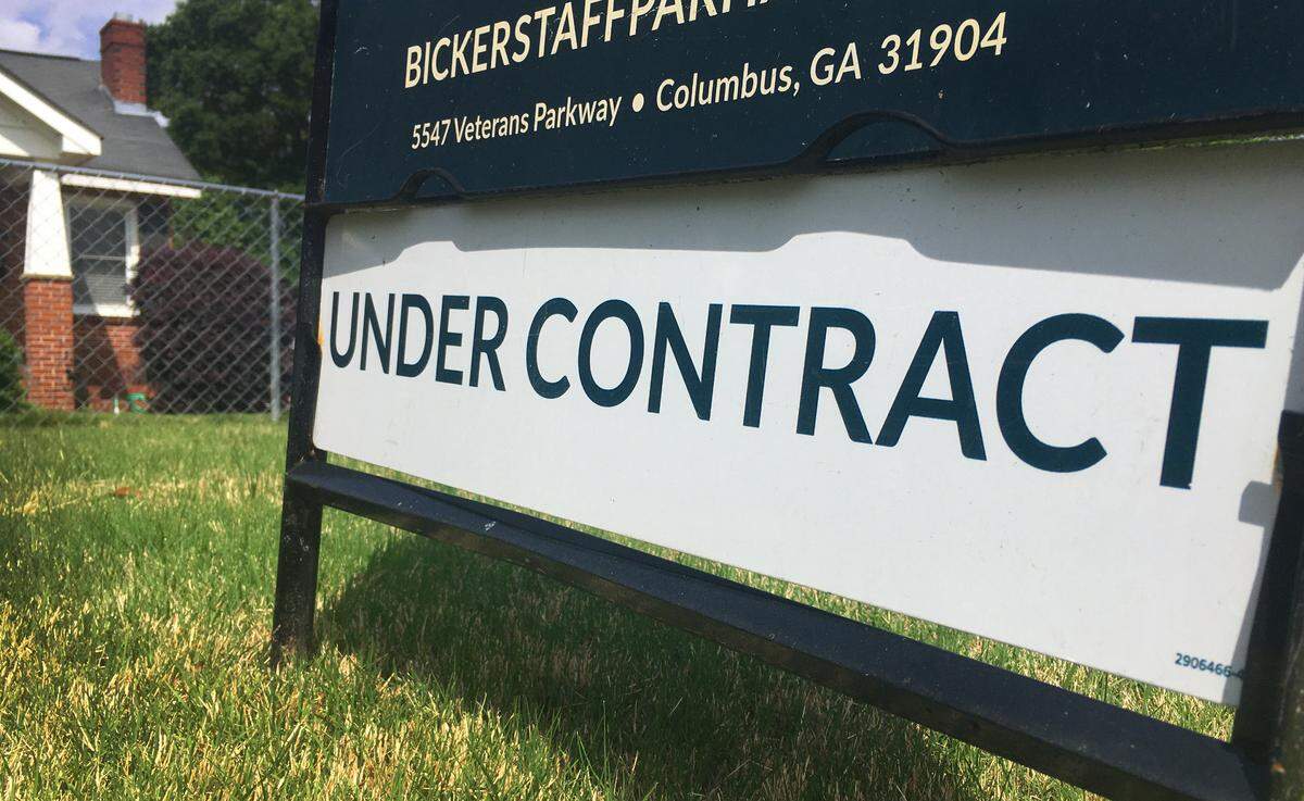 A Bickestaff Parham Real Estate sign indicates this house for sale in Columbus, Georgia is under contract. 04/28/2021