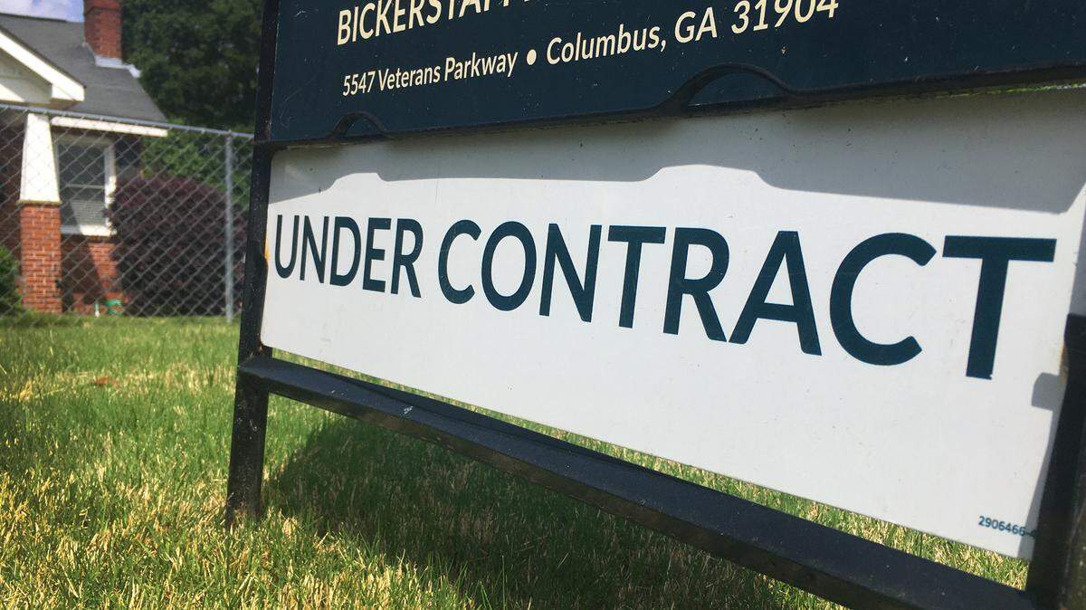 A Bickestaff Parham Real Estate sign indicates this house for sale in Columbus, Georgia is under contract. 04/28/2021