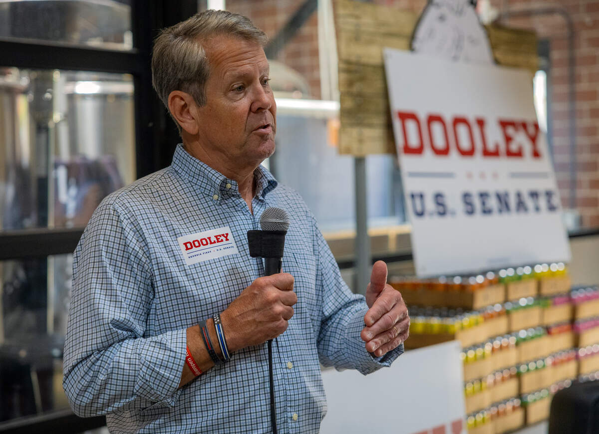 Gov. Brian Kemp speaks in Columbus on June 12, 2026, during a campaign stop for former college football coach Derek Dooley, a Republican candidate for the U.S. Senate.