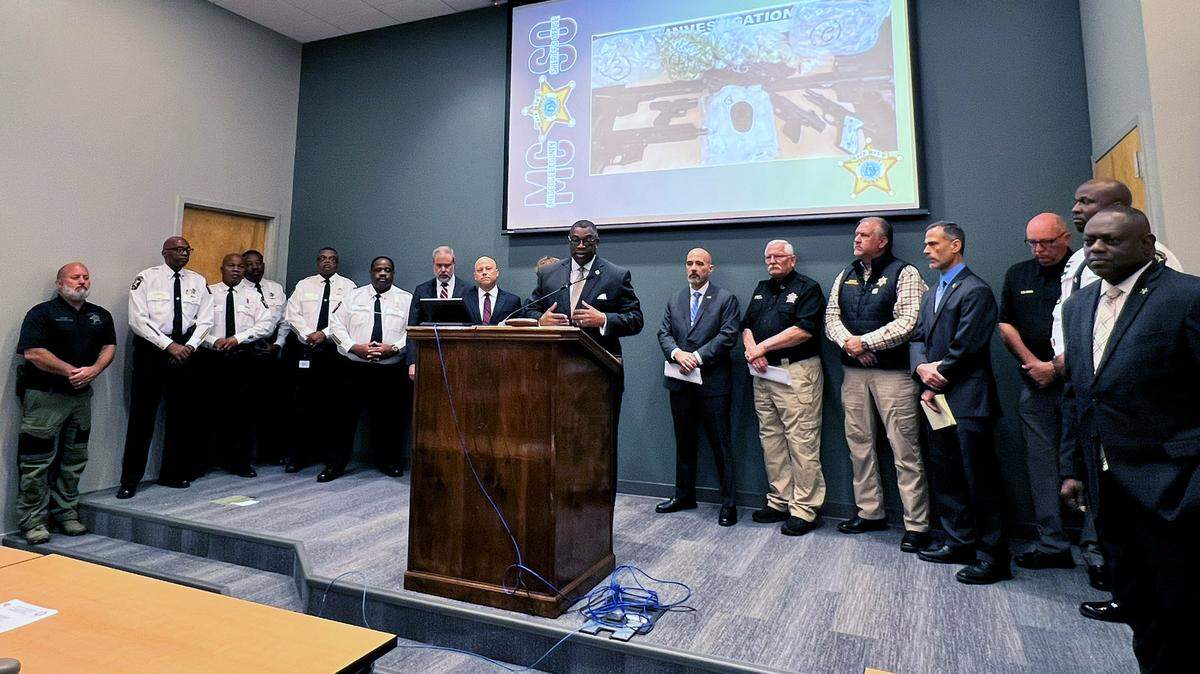 Muscogee County Sheriff Greg Countryman, center, speaks at a Friday morning press conference about the results of Operation Sweet Silence in Columbus, Georgia. 09/13/2024