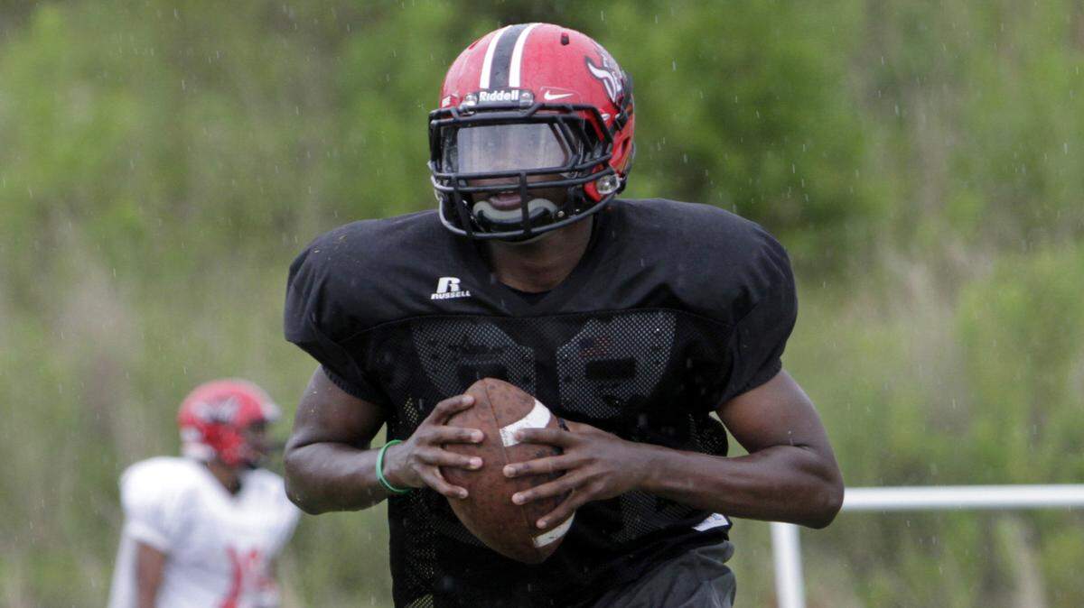 ROBIN TRIMARCHI rtrimarchi@ledger-enquirer.com
As starting quarterback for the Central High Red Devils,  junior Zion Webb is poised to lead his team into the 2015 season.  08.19.15