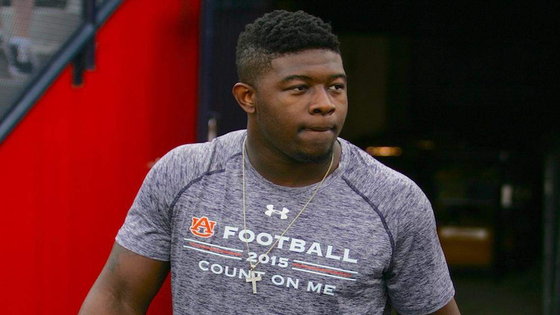 Auburn linebacker Tre Williams walks into Jordan-Hare Stadium before the Iron Bowl.