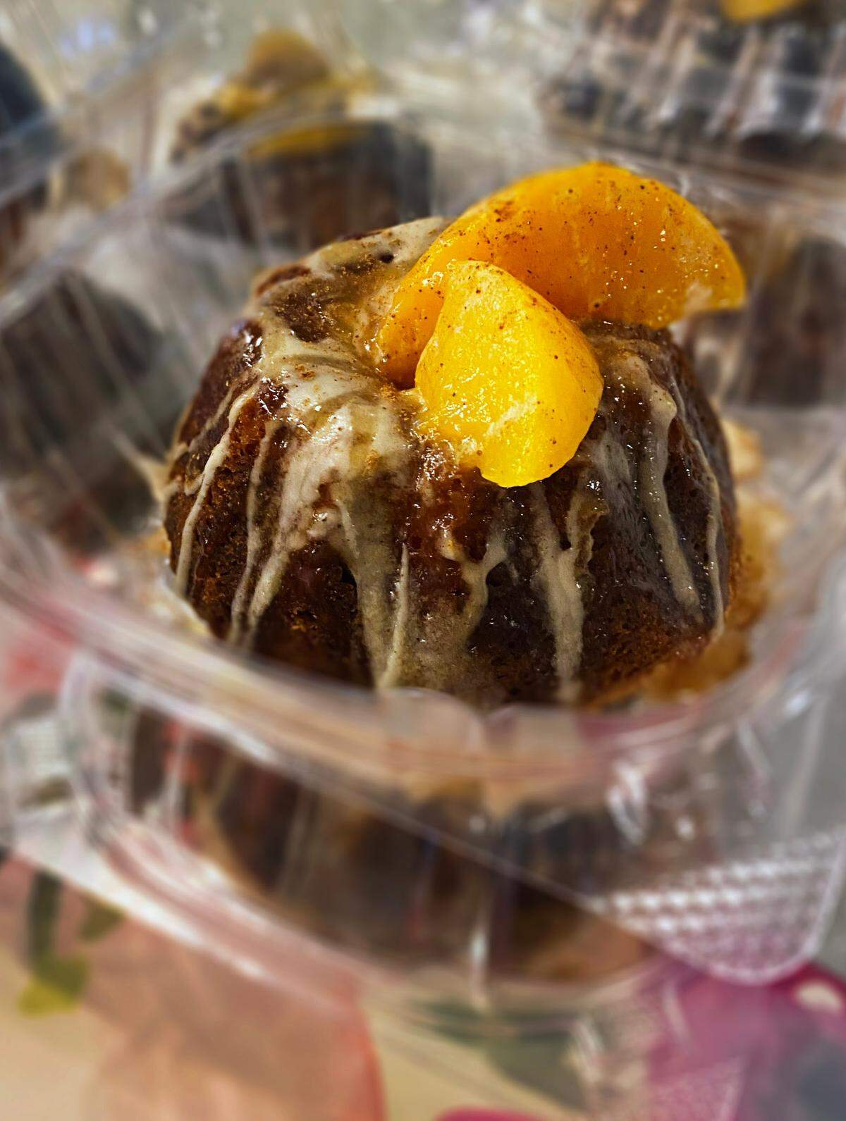 Bakebelieve Cupcakes had these peach cobbler pound cakes available for sale recently at Eloquence Fashion Cafe. It’s a brown sugar pound cake topped with a maple cinnamon glaze, peaches, and caramel sauce. 10/11/2023