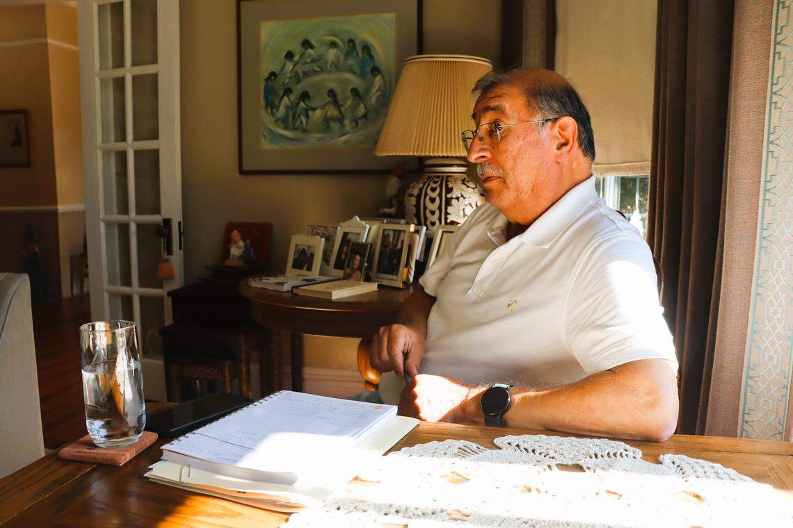 Al Prado speaks in his home to a group of concerned citizens and the Ledger-Enquirer about a proposed data center.