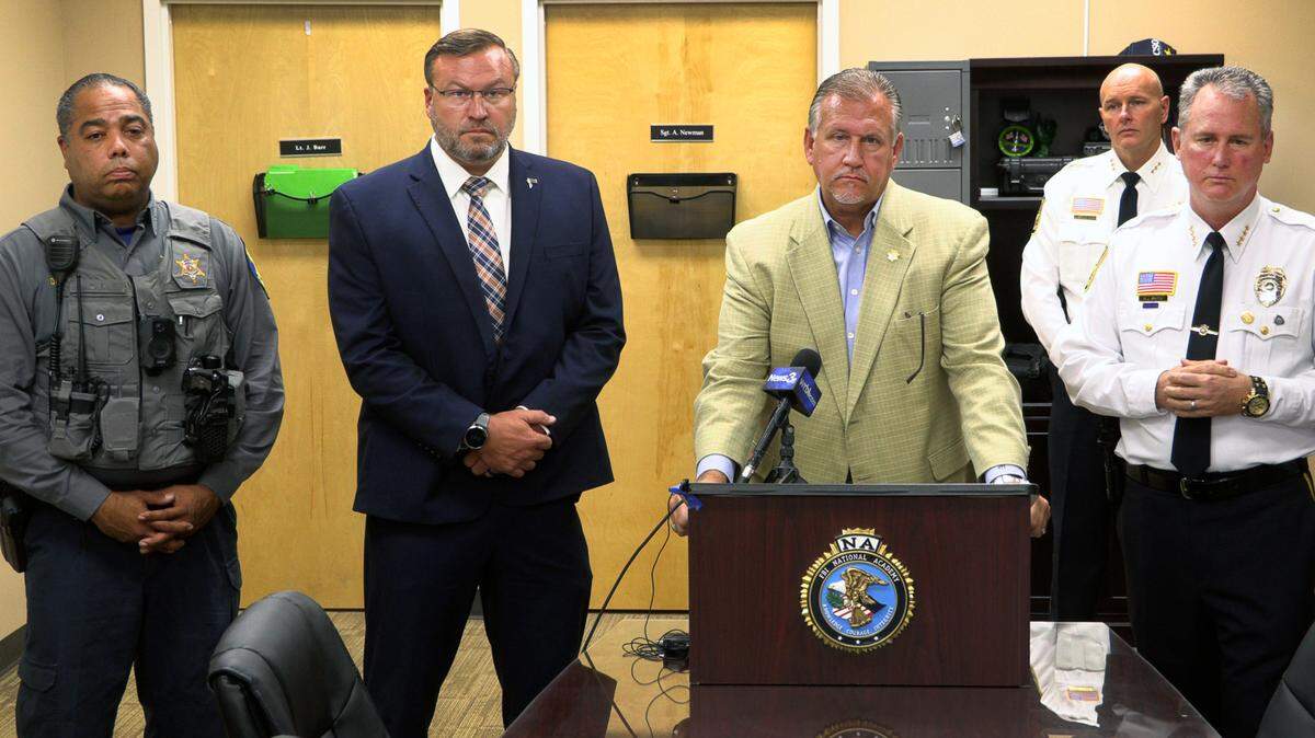 Russell County Sheriff Heath Taylor, center, Phenix City Police Chief Ray Smith, far right, and Mark Sabol, an assistant special agent in charge with the FBI’s field office in Mobile, Alabama, second from left, answer questions at a press conference Friday afternoon related to the disappearance of eleven-year-old Juana Elivia Tadeo Gomez. 11/04/2022