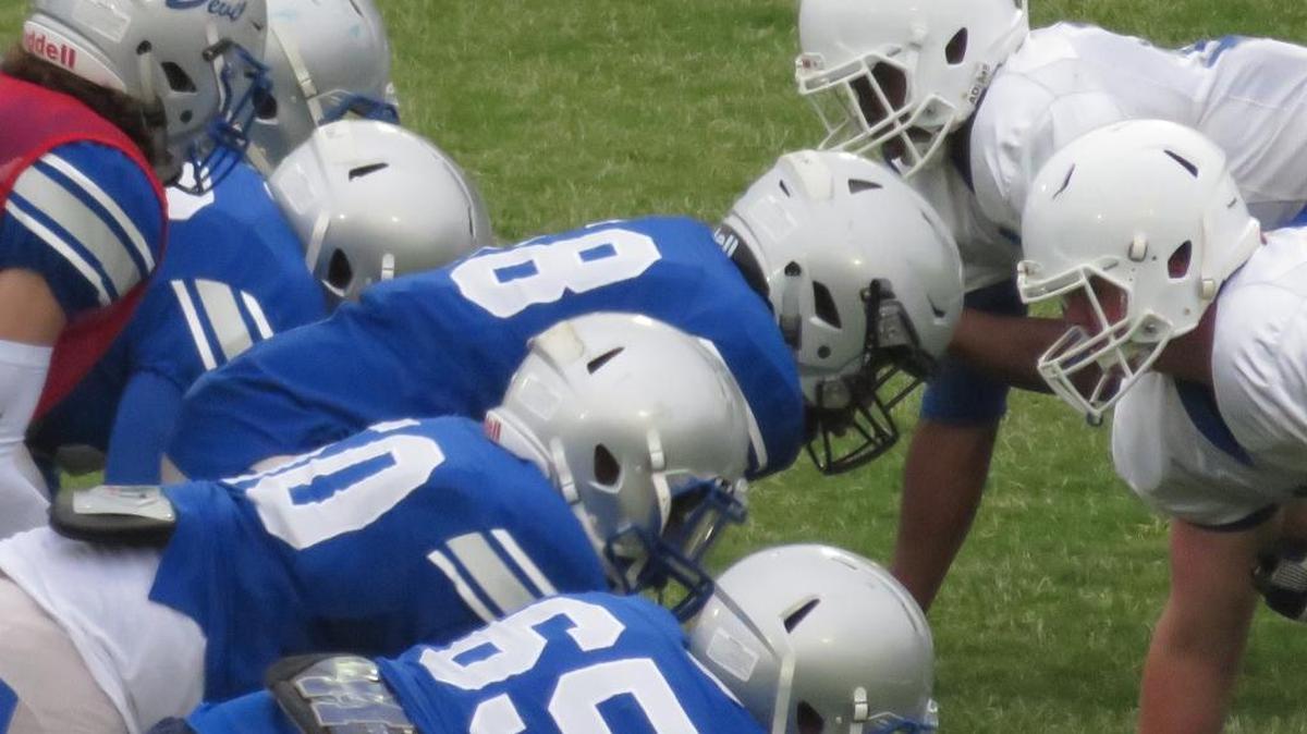 The Manchester Blue Devils (on offense) saw one of their own commit to play college football.