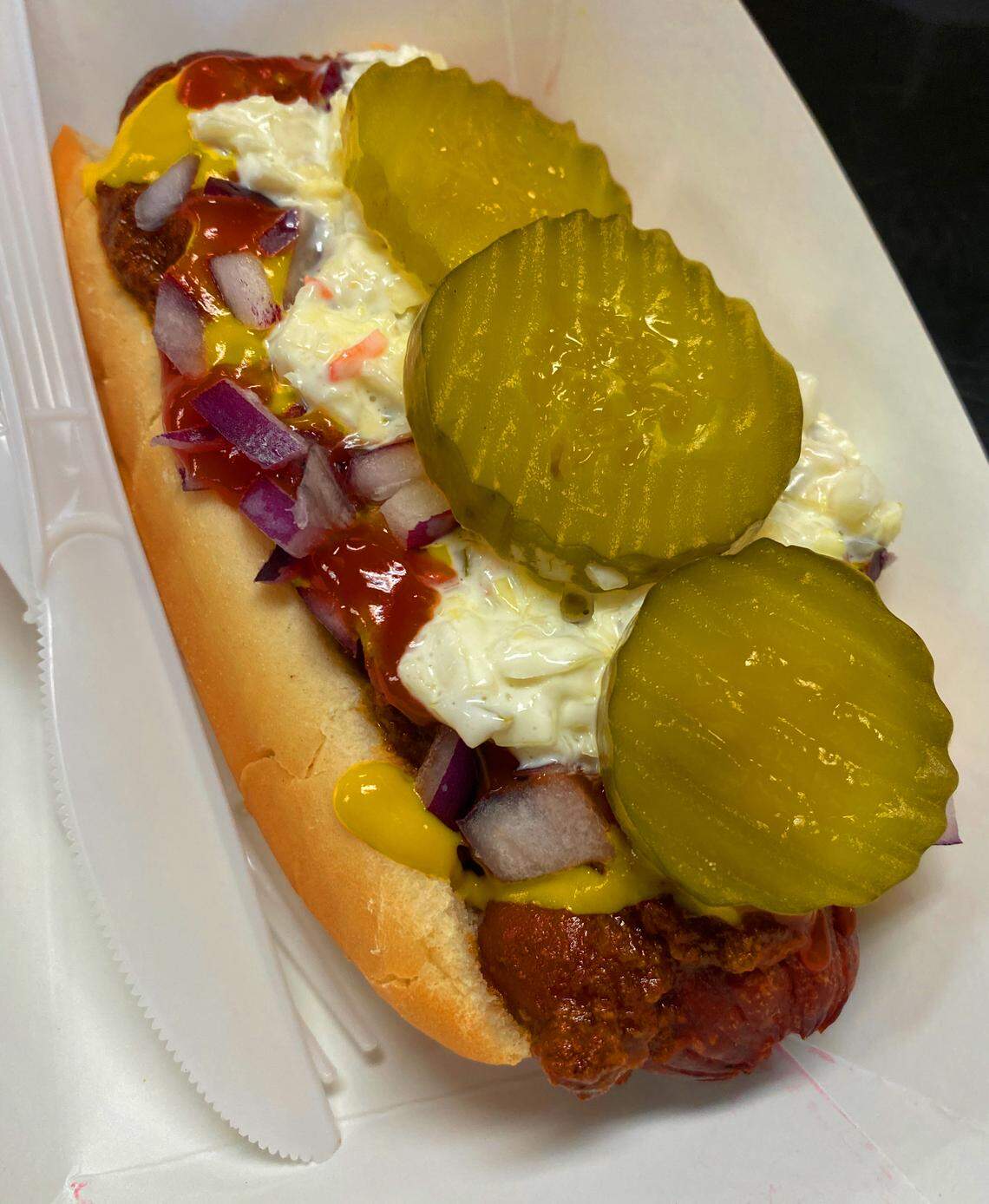 Ledger-Enquirer reporter Kelby Hutchison also ordered a jalapeño sausage dog all the way (chili, mustard, ketchup, onions, slaw and pickles) at Mike & Ed’s Bar-B-Que restaurant in Phenix City on March 5, 2026.