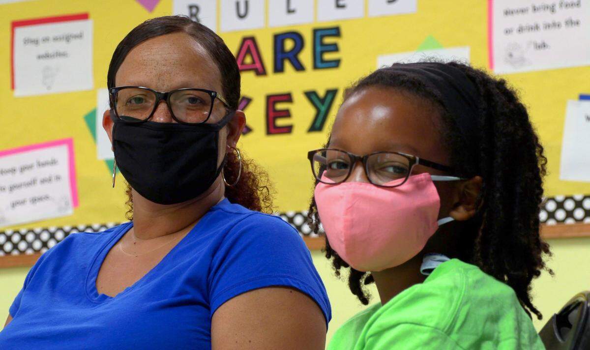 Julie Boylan, left, and her daughter Nahla Boylan pose for a photo at the North Columbus Boys & Girls Club in Columbus, Georgia. The Boys & Girls Clubs of the Chattahoochee Valley is opening a school day camp for children during the Muscogee County School District’s extended closure due to the ongoing coronavirus pandemic.