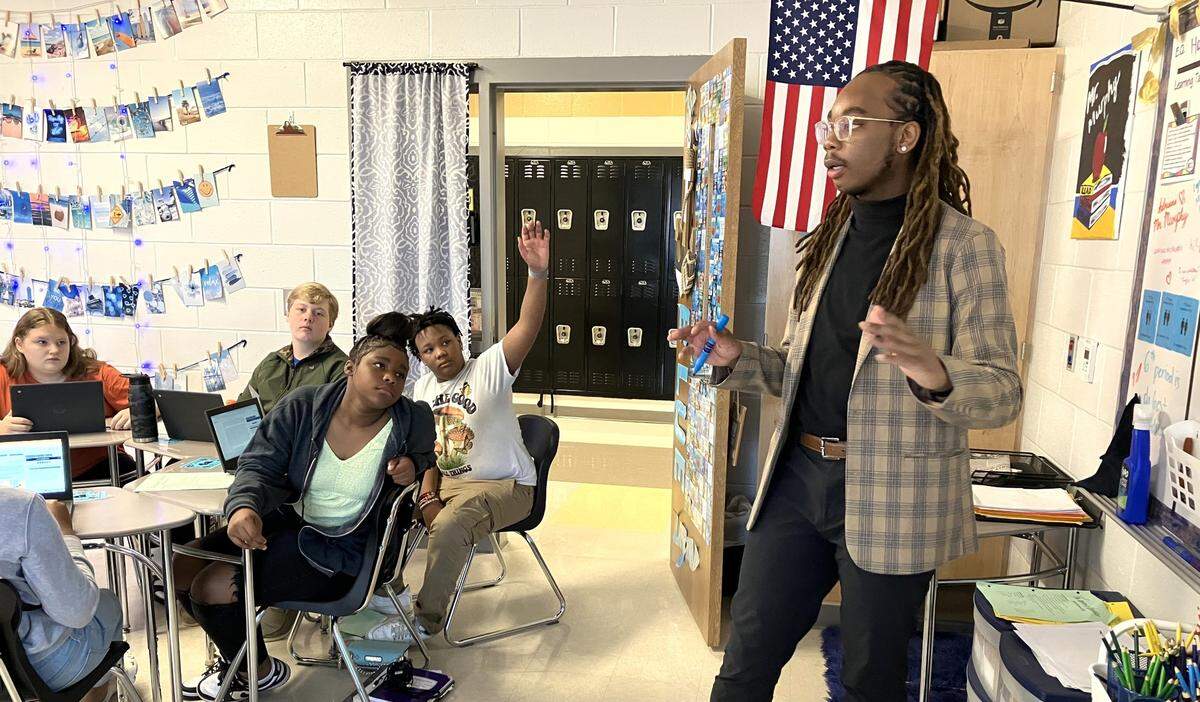 Harris County Carver Middle School English language arts teacher Jalin Murphy teaches one of his seventh-grade classes Oct. 5, 2023. Murphy is the Harris County School District 2023 Teacher of the Year.