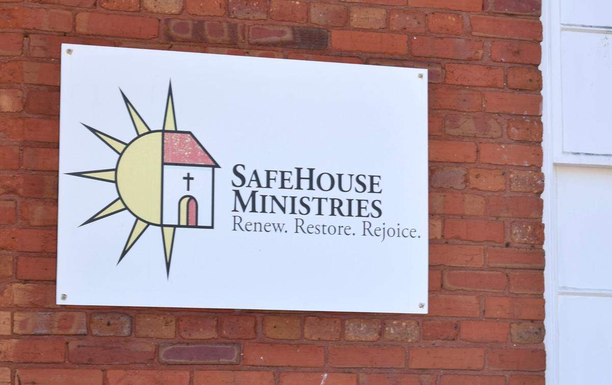 A sign outside SafeHouse Ministries on Hamilton Road in Columbus, Ga.