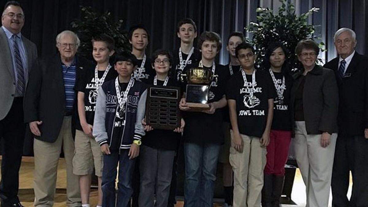 On Nov. 19, 12 middle schools from the Muscogee County School District met at Shaw High to compete in the annual Professional Association of Georgia Educators (PAGE) Academic Bowl. Aaron Cohn Middle School made the record of being the undefeated team (7-0). They won the district bowl and will advance to the regional competition in January. Team members are, from left, front row, Kevin Guernsey, Patrick Cousins, Clark Cousins and Aditya Singh; back row, Talmage Roberts, Ramen Xie, Hunter Sloans and Bradley Maddox. 
 The PAGE Academic Bowl for Middle Grades was originally conceived 1983. In 1985, the bowl become the first program supported by the PAGE Foundation. Approximately 750 middle school students participated in the inaugural event. 
 The bowl has continued to grow, with 1,400 students participating during the 2014-15 school year. The competition is held in a quiz-bowl format with buzzers as two teams compete in a play-off system. Participants are asked questions from many subjects. The competition is open to public and private middle school students in grade 6-8. The program is to promote academic excellence and good citizenship.