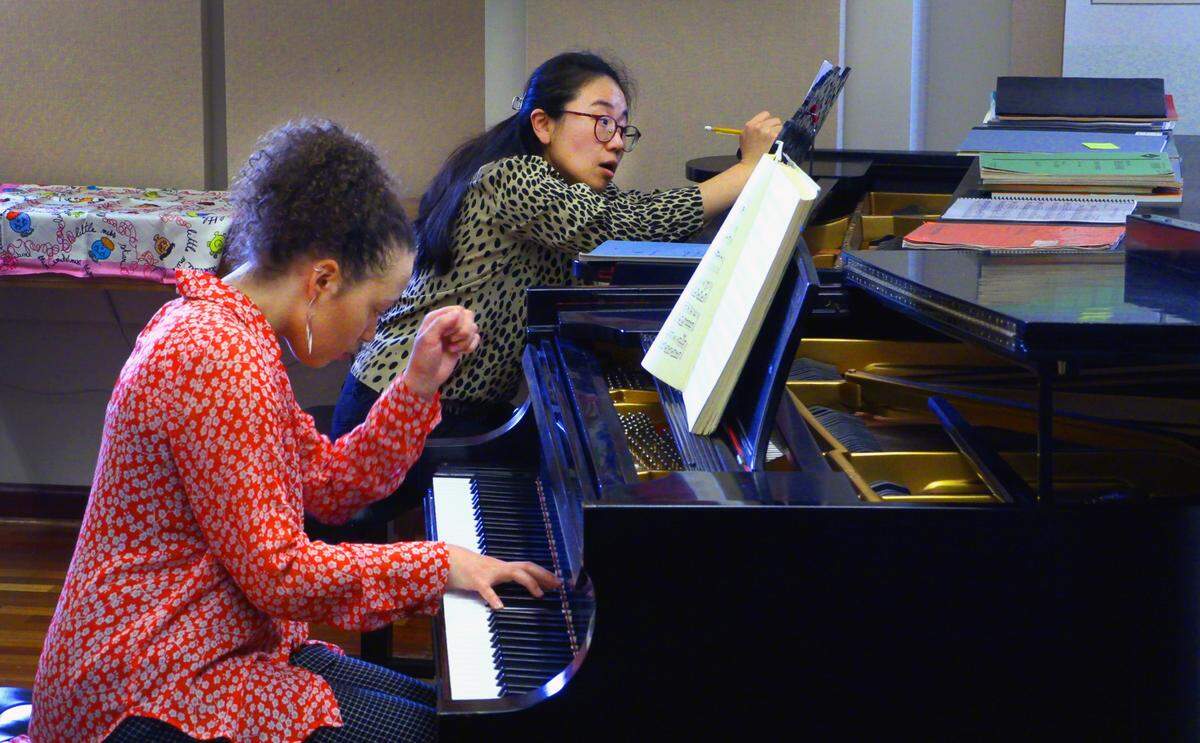 Nikol Bazalytska, left, a student at Columbus State University, plays as Esther Park, associate professor of piano at CSU’s Schwob School of Music, listens. 02/24/2023