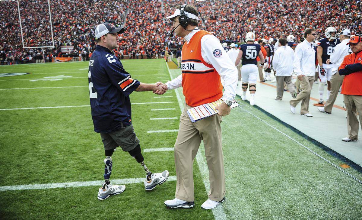 Gus Malzahn, Josh Wetzel Auburn vs Texas A&M in Auburn, Ala. on Saturday Nov. 8, 2014 at Auburn Arena Photo by Wade Rackley/Auburn Athletics