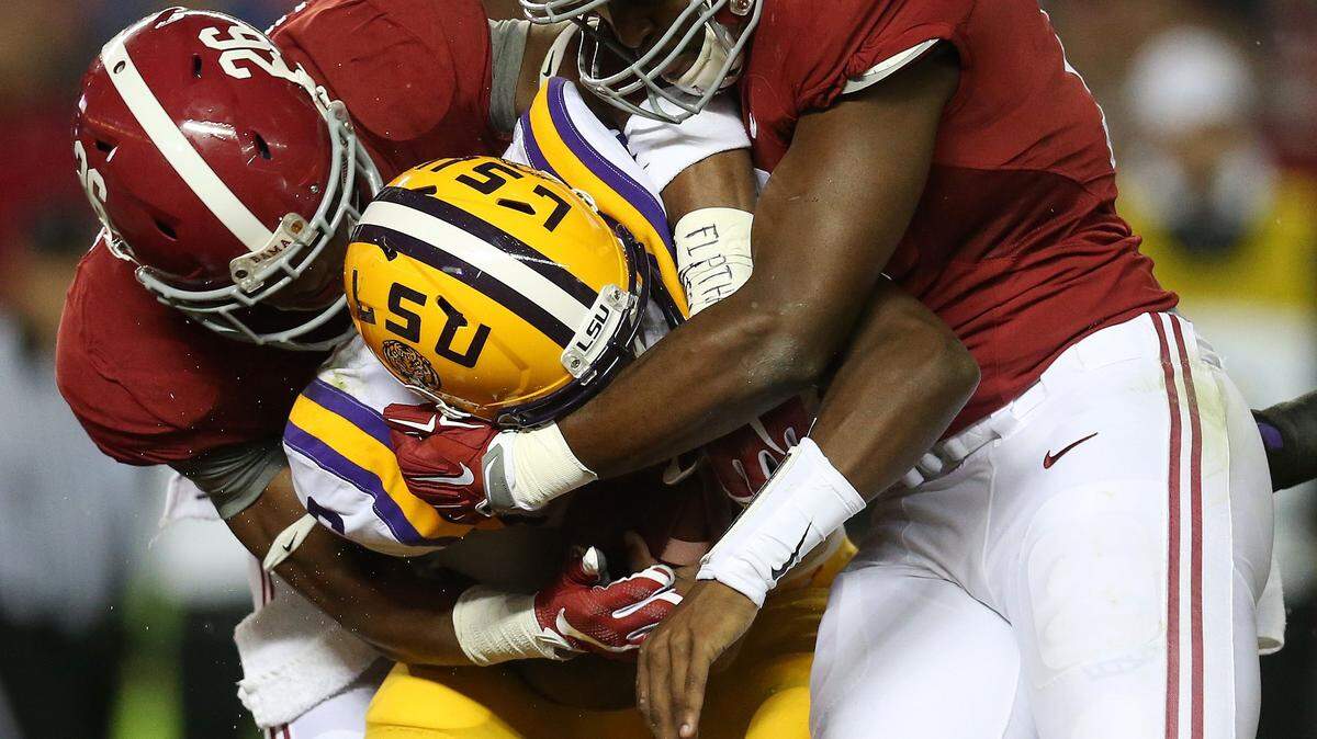JOHN BAZEMORE/Associated PressLSU quarterback Brandon Harris (6) is hit by Alabama linebacker Reggie Ragland (19) and Alabama defensive back Marlon Humphrey (26)Nov. 7 in Tuscaloosa, Ala.