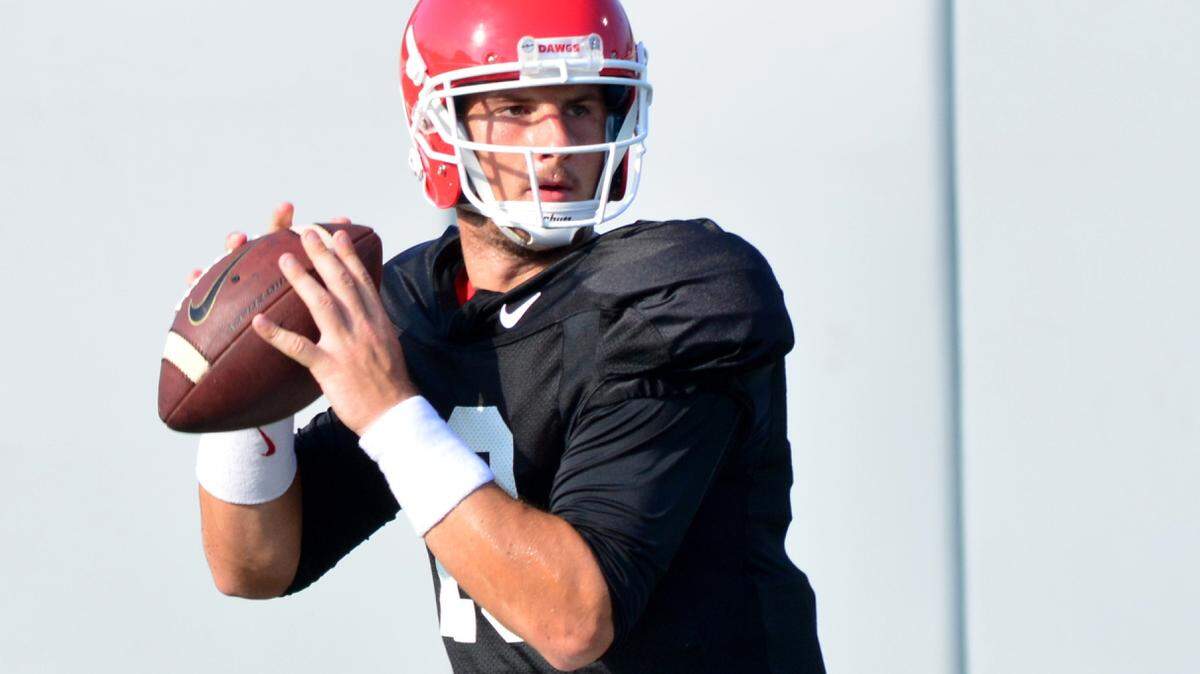 STEVEN COLQUITT/UGAGeorgia quarterback Faton Bauta (10) throws during the Bulldogs' session on the Woodruff Practice Fields Tuesday in Athens, Ga.