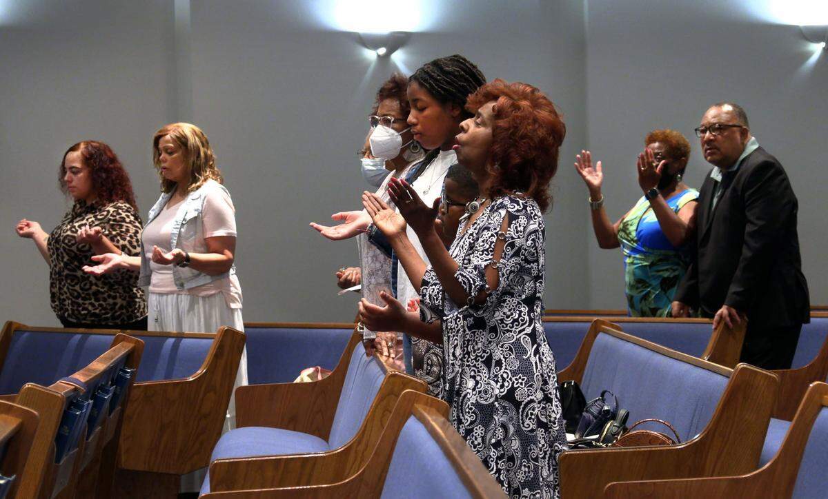 Worshipers at Pinehurst Baptist Church in Columbus, Georgia join in praise during a recent service.