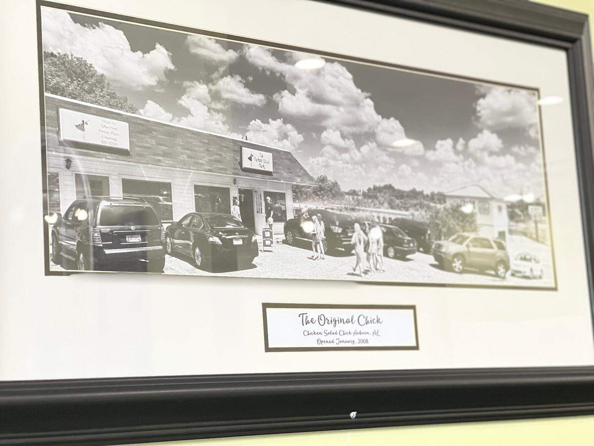An image of the first Chicken Salad Chick hangs on the walls in the Columbus location on Airport Thruway. The franchise is opening another location in Phenix City in 2023.