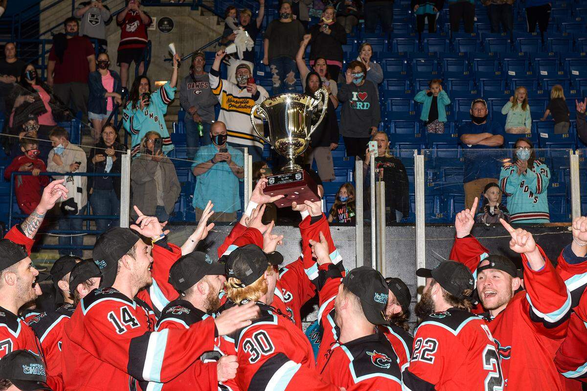 The Columbus River Dragons celebrate with their championship trophy after their win against Elmira in game three of the Ignite Cup Finals 8-1, sweeping the series 3-0, Friday night, April 30, 2021