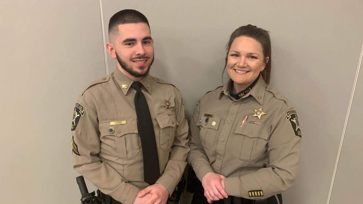 Cpl. Maximus Raniero (left) and Deputy Stephanie Culberson pose for a photo in the Conference Center at Piedmont Columbus Regional’s Midtown Campus.