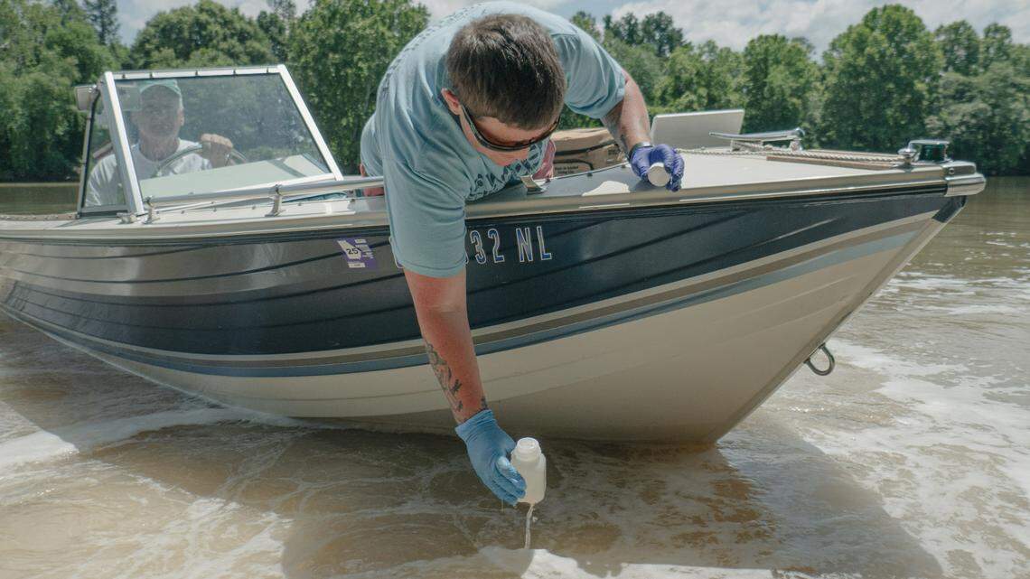 Ashley Desensi, Technical Programs Specialist for the Chattahoochee Riverkeeper taking samples of E.Coli bacteria at the wastewater treatment plant outfall in Chattahoochee River on June 4, 2024.